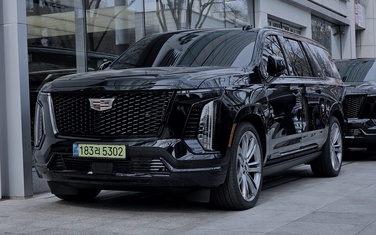 Interior and exterior detail of an MHM executive suvs Cadillac Escalade ESV prepared for a client transfer
