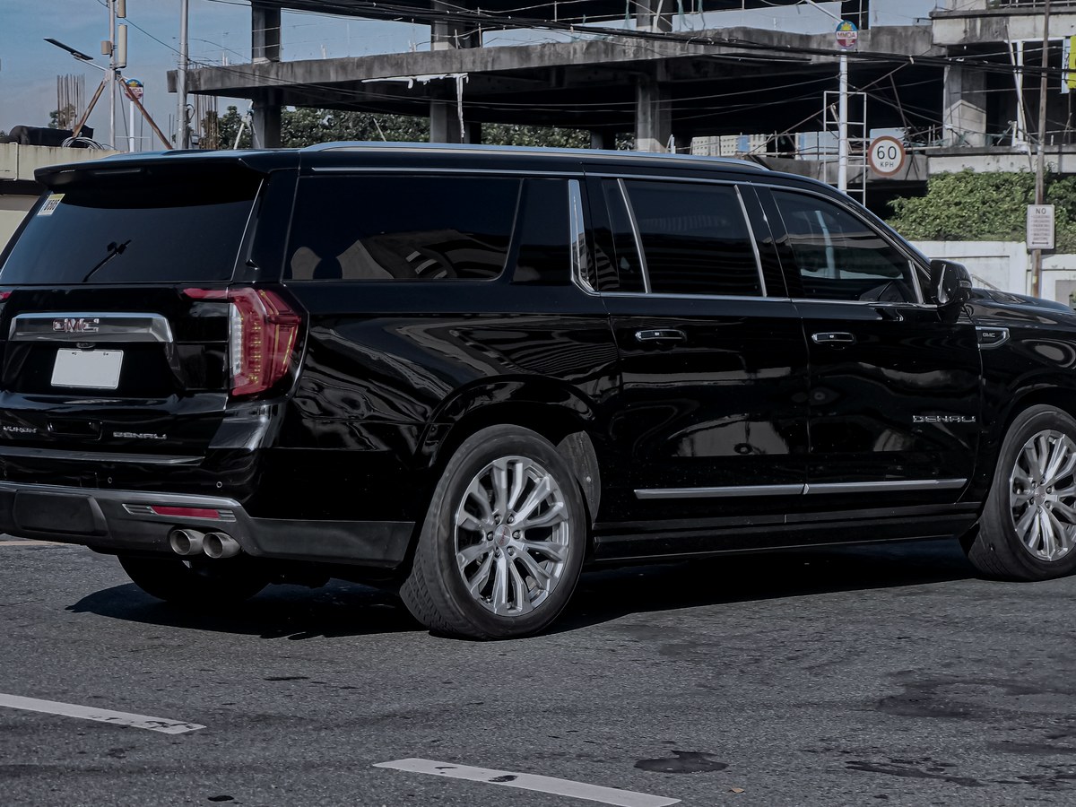 2025 GMC Yukon XL in black — Executive SUVs chauffeur vehicle seating 6 passengers