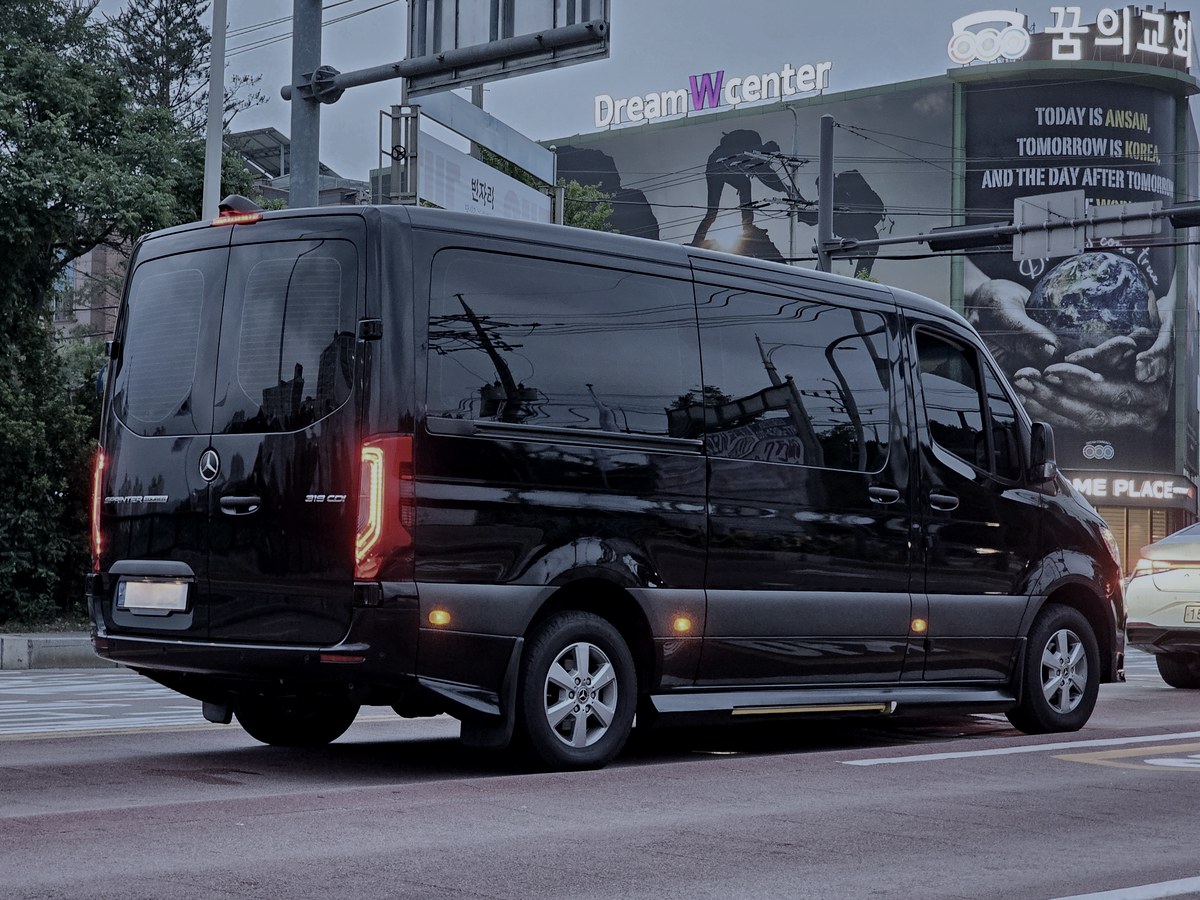 2025 Mercedes-Benz Sprinter in black — Executive Vans chauffeur vehicle seating 14 passengers